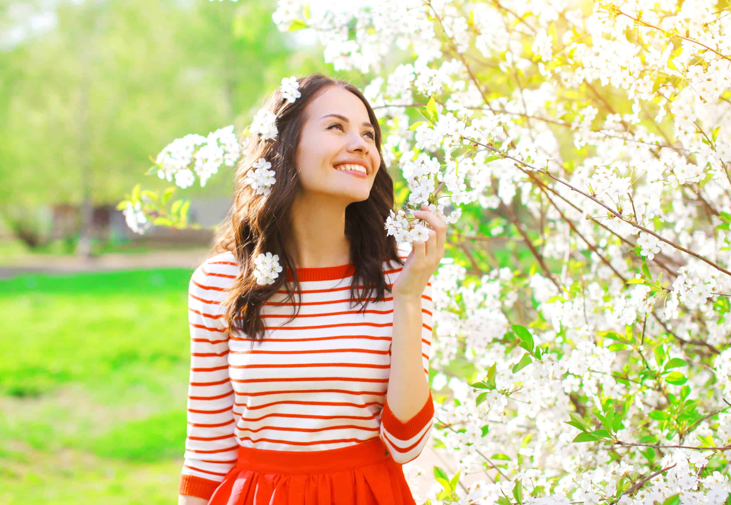 Spring smile. Spring woman. Spring woman portrait. Spring with people. Enjoying of Spring.